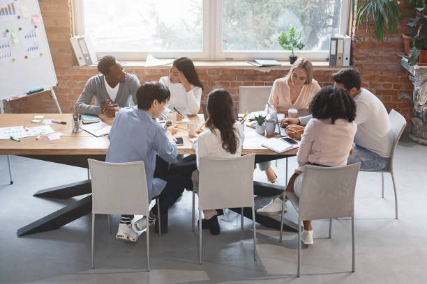 istock Business meeting of young creative people, office interior 2175710849