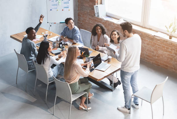 istock Young international business team having morning briefing 2175710910