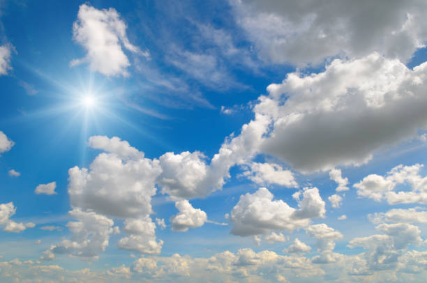 istock Blue sky with clouds and bright sun. 2175711946