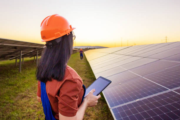 istock Woman Inspecting Solar Panels 2175725274