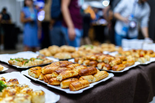 istock A diverse spread of assorted savory pastries displayed at a vibrant food event 2175727778