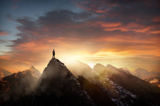 istock Reaching The Top Of A Mountain At Sunset 2175729562