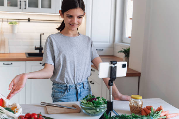 istock Young cook enthusiast explaining healthy meal choices 2175729842