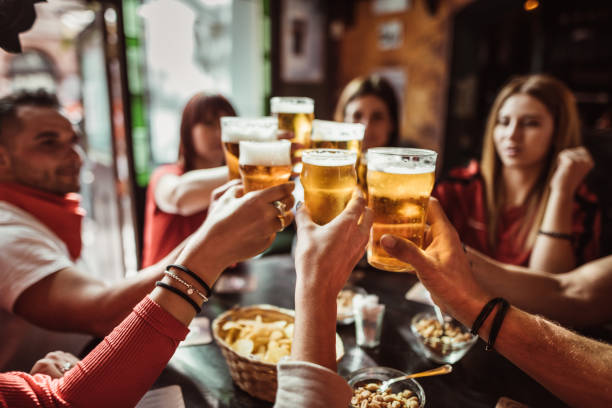 istock friends at pub drinking beer 2175732279