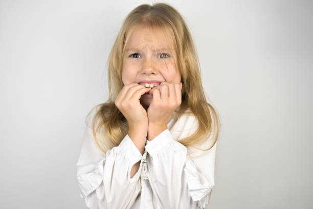Close-Up Portrait Of Girl Screaming Outdoors