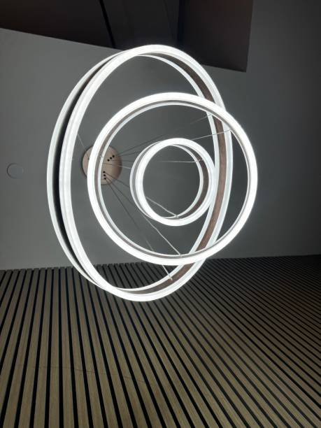 istock Modern circular light fixture casting unique shadows in a contemporary interior space 2175757100