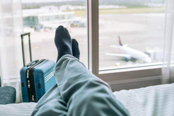 istock Person resting during stopover at the airport. 2175758240