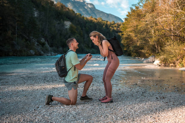 istock Caucasian Couple's Riverbank Proposal 2175768935