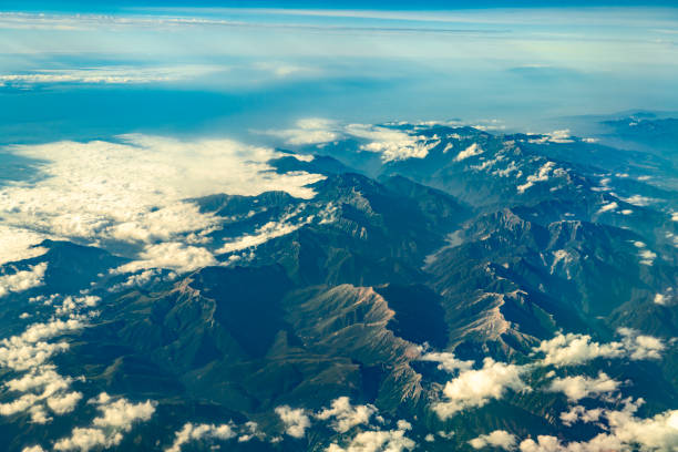 aerial view of mountain range in fog