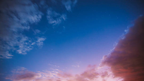 istock Night Starry Sky Transition To Bold Blue Morning Sunset Sky. Real Colorful Night Sunset Sky Stars. Night Sky With Glowing Stars. From Dusk Till Dawn Bright Blue, Yellow, pink Colors. natural background backdrop summer-background, summer background 2175776878