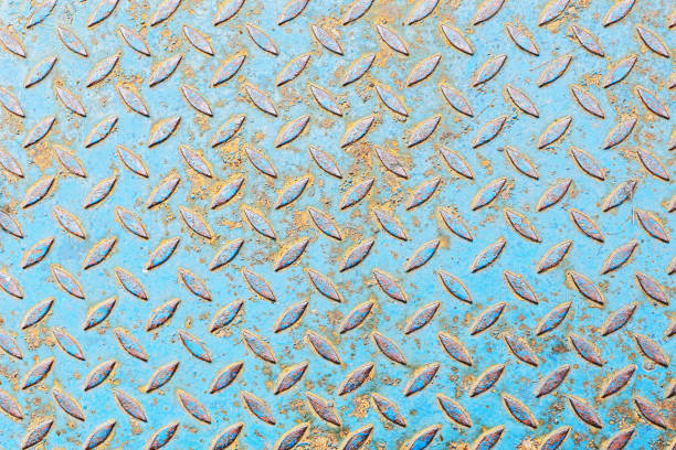 istock Blue peeling paint. Rusty metal grid walkway. Grunge steel mesh texture. Heavy iron backdrop pattern. Industrial grate design background. 2175779649