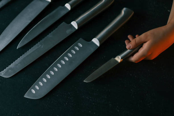 istock Casting steel various chef knife, Set of modern sharp kitchen knives on dark background 2175781434