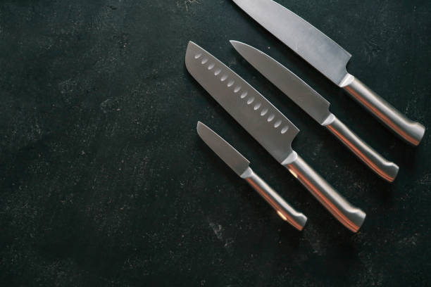 istock Casting steel various chef knife, Set of modern sharp kitchen knives on dark background 2175781816