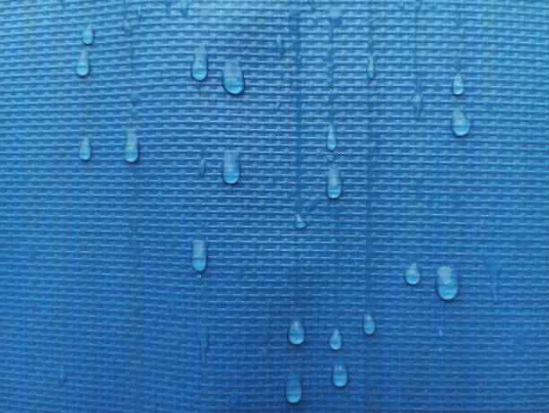 istock Water drops on tarp, shadow blue tarp. Background in sturdy, 2175794049