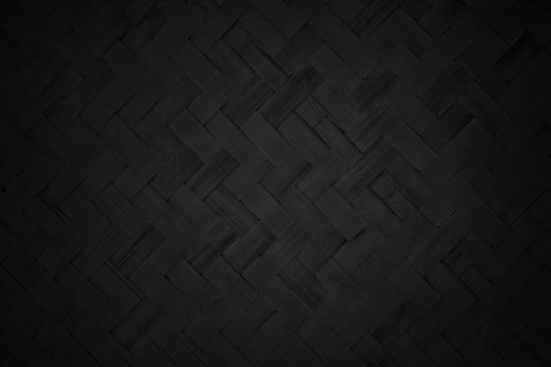 istock Black bamboo weaving pattern, old woven rattan mat texture for background and design art work. 2175798881