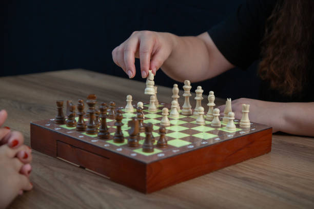 istock Hand moving the knight in chess game 2175799686