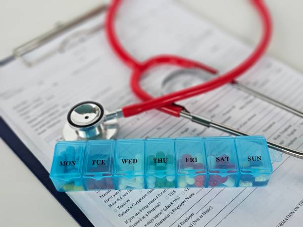 istock Collection container for medicines and nutritional supplements medical record and stethoscope 2175807973
