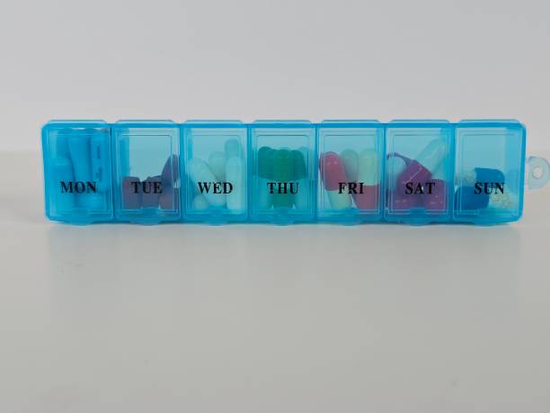 istock Pills, capsules, antibiotics, various colors on a white background concept 2175807975