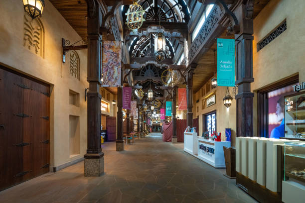 Madinat Jumeirah shopping mall in Dubai seen during day. Small souks and shops on the side of the street.
