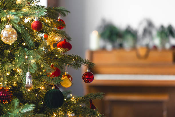 istock Christmas background with decorated Christmas tree and piano, copy space. 2175810627