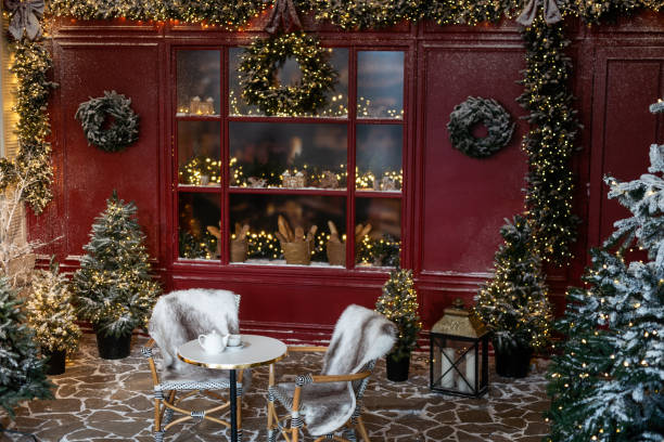 istock Brightly illuminated christmas decorations cafe. Outside decor for winter holidays 2175813591