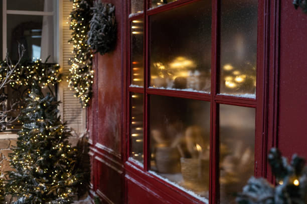 istock Brightly illuminated christmas decorations cafe. Outside decor for winter holidays 2175813640