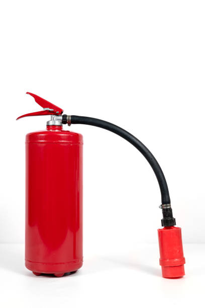 istock A red fire extinguisher with black hose on white background 2175815714