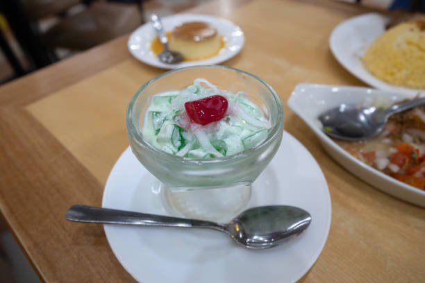 Traditional Filipino desserts Buko Pandan Salad with spoon