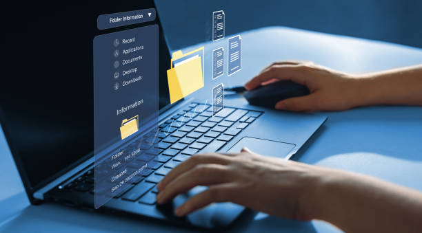 istock Process automation to efficiently manage files. Businesswoman working on laptop with virtual screen. Online documentation database and document management system concept. 2175823930