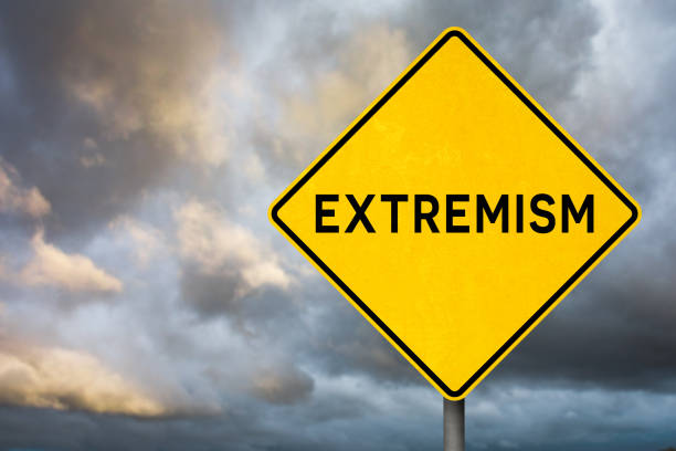 A yellow diamond-shaped road sign with the word \
