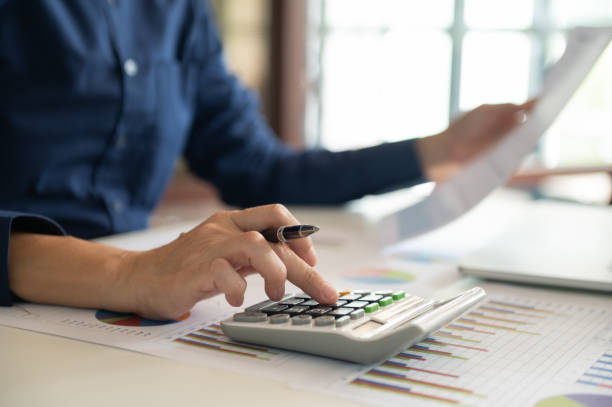 finance manager calculated capital prepare plan and budget for financial management of organisation . stock photo