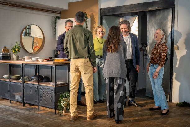istock Welcoming Guests at a Modern Home Dinner Party 2175836146
