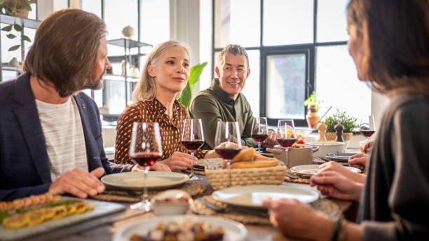 istock Diverse Group Savors Gourmet Cuisine at Home Gathering 2175836162