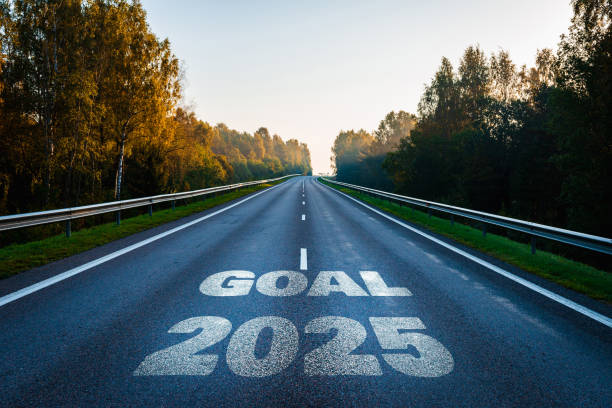 istock 2025 goal plan to success, Business target, growth strategy. New year resolution and challenge. 2025 on the road in the middle of asphalt road with at sunset forward and planning to the goal. 2175836246