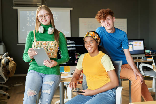 istock Group of People Smiling in IT Classroom 2175838475