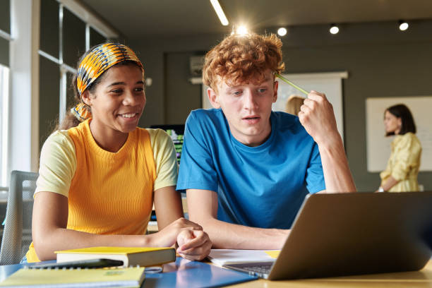 istock Boy and Girl using Laptop in College 2175838480