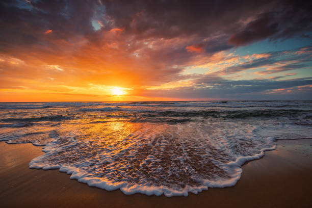 istock Beautiful cloudscape over the sea shore during scenic dramatic sunrise. 2175848215