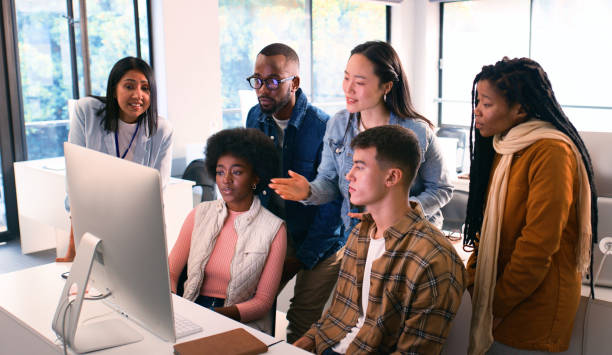 istock Diverse Group of Students Engaged in a STEM Lecture Discussing Concepts in a Modern Classroom Setting 2175848531