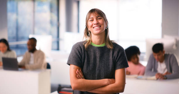 istock Confident Student Smiling in a Diverse STEM Lecture Room with Engaged Peers 2175848542