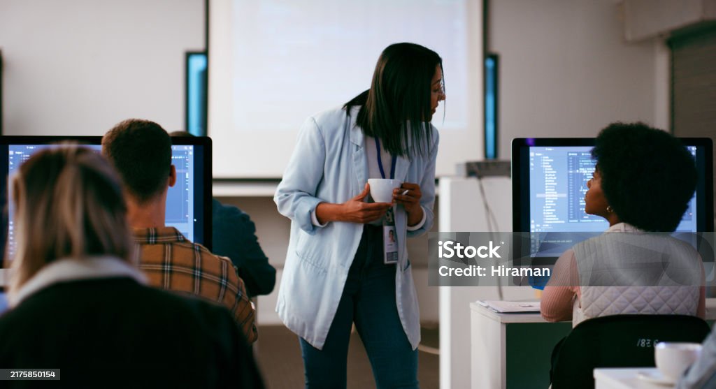 Multi Ethnic Group Of Students Engaged In A Stem Coding Lecture In A ...