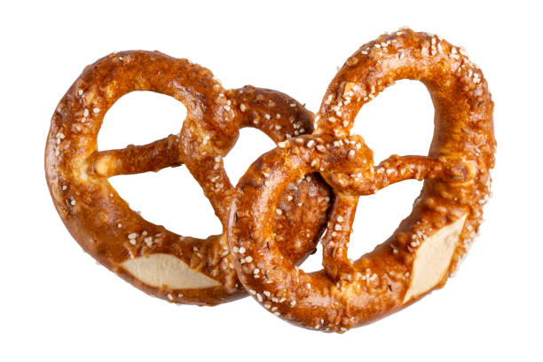 istock Two soft pretzel with salt isolated on white background. 2175855204