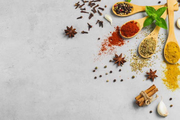 istock Various Asian spices in spoons on grey background. Top view with free space 2175855733