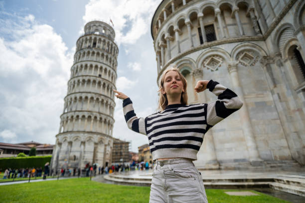 istock Girl holding Leaning Tower with her finger 2175857694