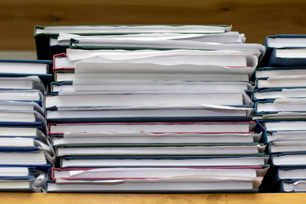 istock archive of documents in folders on shelves. complaint statements office work 2175859504