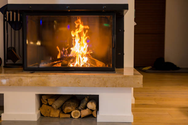 istock Warm cozy fireplace burning wood logs on a cold winter evening 2175868120