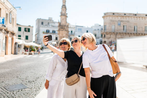 istock Three Female Tourists Enjoying In Italy 2175878009