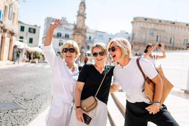 istock Three Female Tourists Enjoying In Italy 2175878028