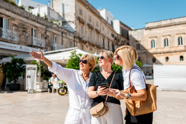 istock Three Female Tourists Enjoying In Italy 2175878303