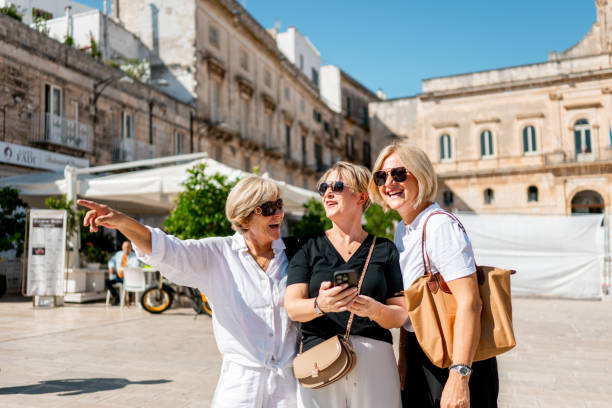 istock Three Female Tourists Enjoying In Italy 2175878328