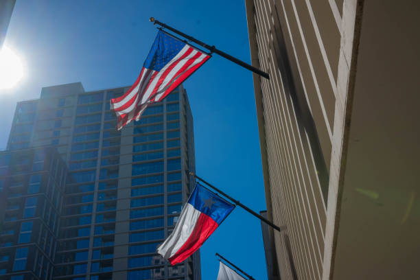 istock American and Texas flag 2175879186